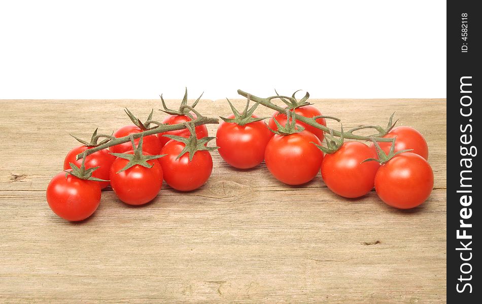 Vine tomatoes on old wood