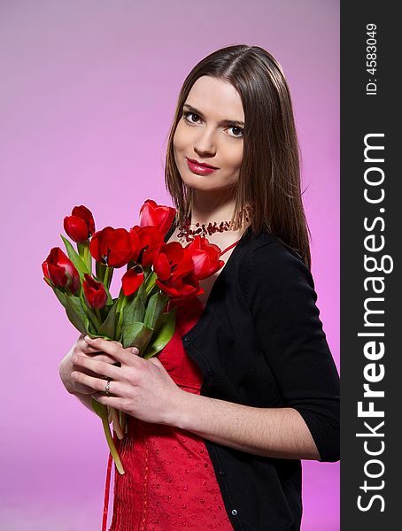 Portrait of young woman with flowers