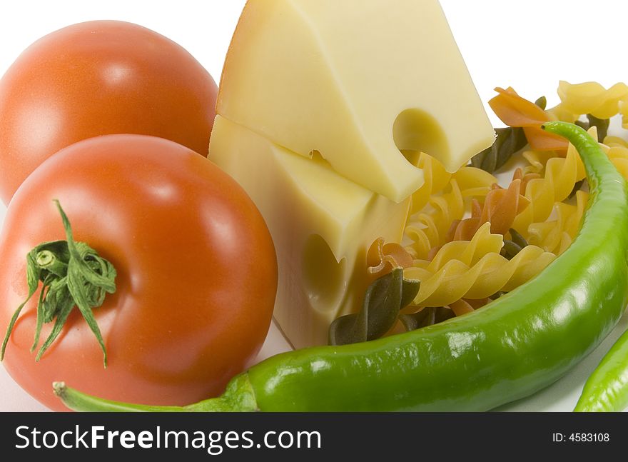 Vegetables, cheese and pasta background