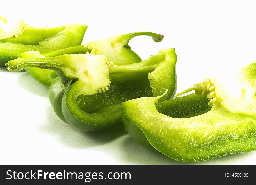 Slices of green bell pepper. Slices of green bell pepper