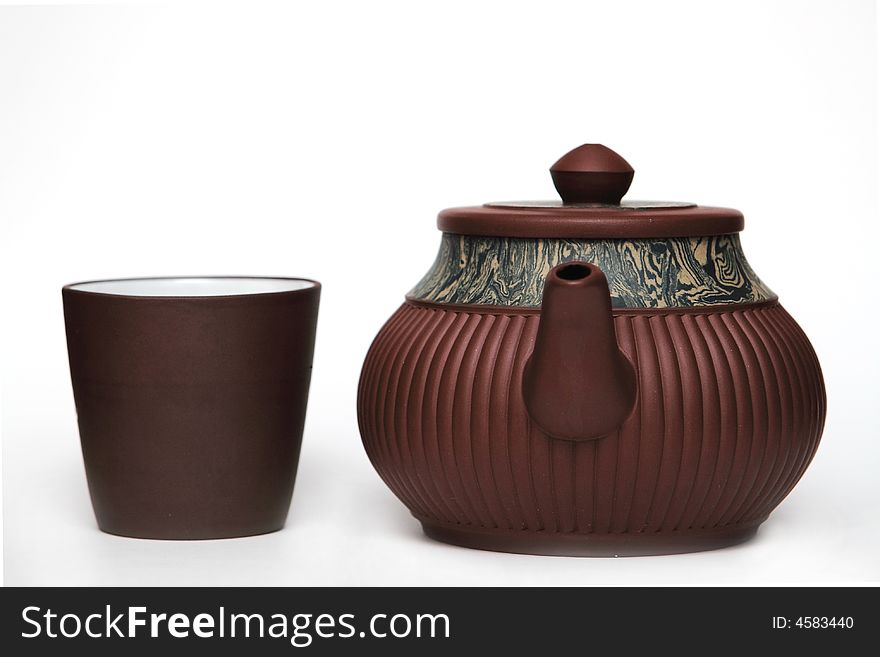 Traditional japan teapot with a cup