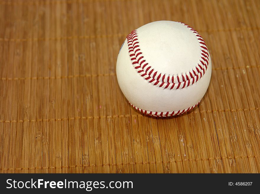 A picture of a baseball ready to be tossed into the game. A picture of a baseball ready to be tossed into the game