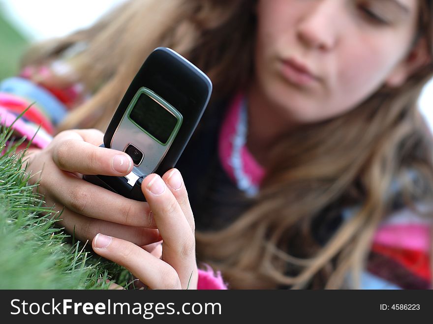 Young girl and cellphone