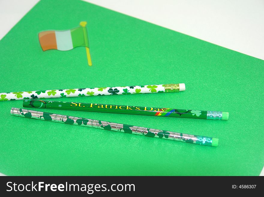 A picture of pencils and folders representing St. Patrick's Day. A picture of pencils and folders representing St. Patrick's Day