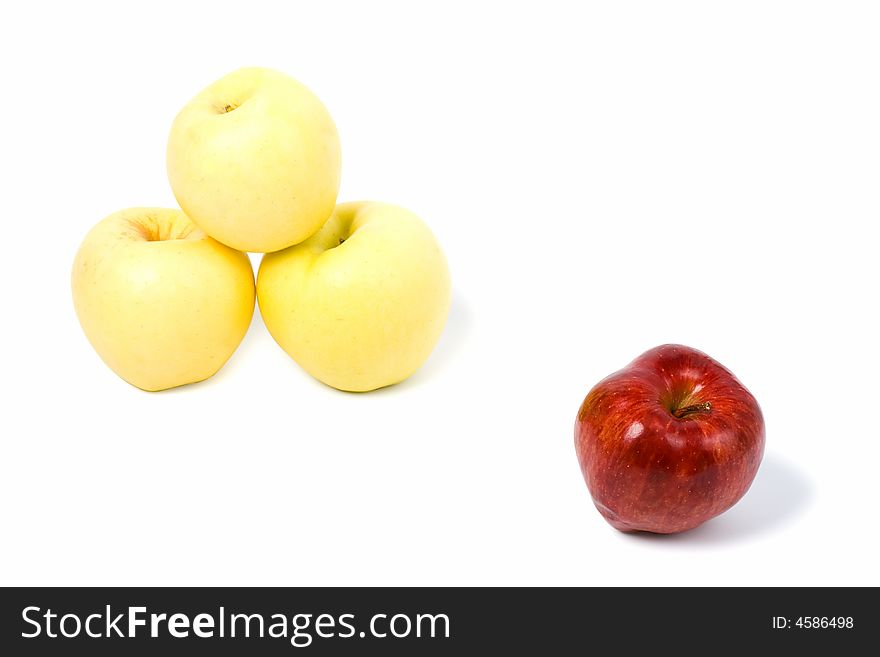 Three yellow and one red apples isolated on white background. Three yellow and one red apples isolated on white background