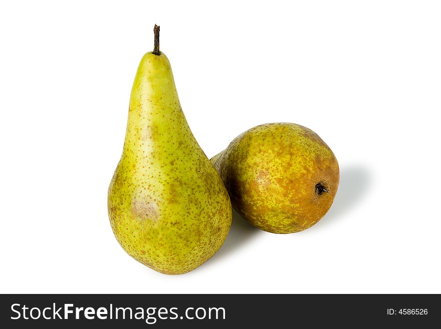 Two green sweet pears isolated on white
