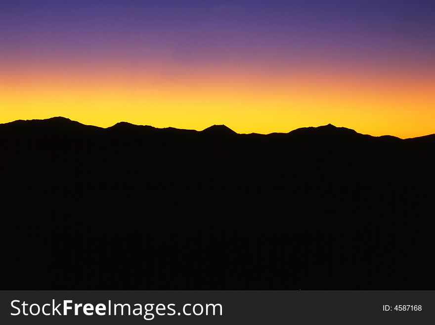 A fiery sunrise over the silhouette of sacred Fuji. A fiery sunrise over the silhouette of sacred Fuji