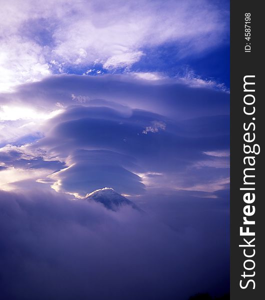 Mount Fuji enshrouded in clouds. Mount Fuji enshrouded in clouds