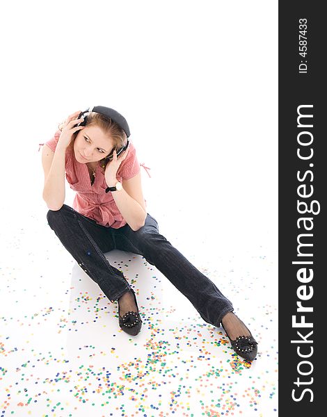 The young girl with a headphones isolated on a white background