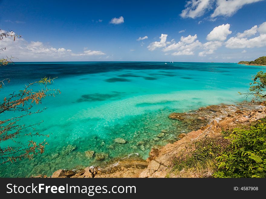 Secluded beach and turquoise waters on tropical island. Secluded beach and turquoise waters on tropical island