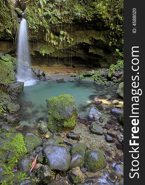 Spectacular waterfall with Emerald Pool at bottom. Spectacular waterfall with Emerald Pool at bottom