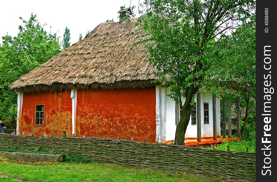 Country house in Pirogovo village (Ukraine) with red wall. Country house in Pirogovo village (Ukraine) with red wall