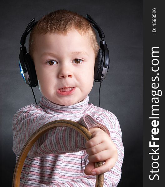 The Child With Ear-phones