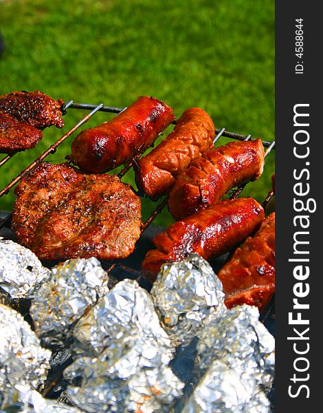 Summer time - Sausages on a barbecue