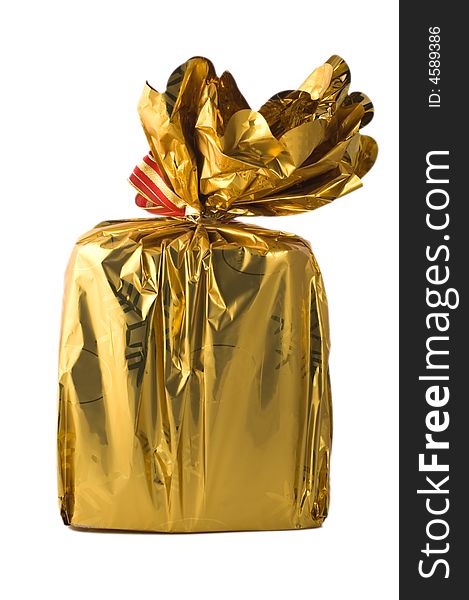Present wrapped in golden paper isolated on white. Present wrapped in golden paper isolated on white
