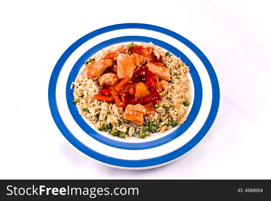 Sweet and Sour Chicken on a white background.
It consists of large thinly sliced pieces of chicken pork in potato starch batter, deep-fried twice until crispy. They are then lightly coated in a variation of a sweet and sour sauce, made from freshly prepared syrup and rice vinegar, flavoured with ginger and garlic. The batter absorbs the sauce and softens. Sweet and Sour Chicken on a white background.
It consists of large thinly sliced pieces of chicken pork in potato starch batter, deep-fried twice until crispy. They are then lightly coated in a variation of a sweet and sour sauce, made from freshly prepared syrup and rice vinegar, flavoured with ginger and garlic. The batter absorbs the sauce and softens.