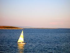Rowing Yellow Sailing Boat Stock Images