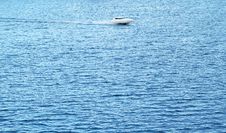 Small And Lonely Boat On The Big Sea Stock Photo Small And Lonely Boat On The Big Sea Stock Photo