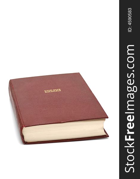 Closing bible on white background, headline in russian language. Isolated