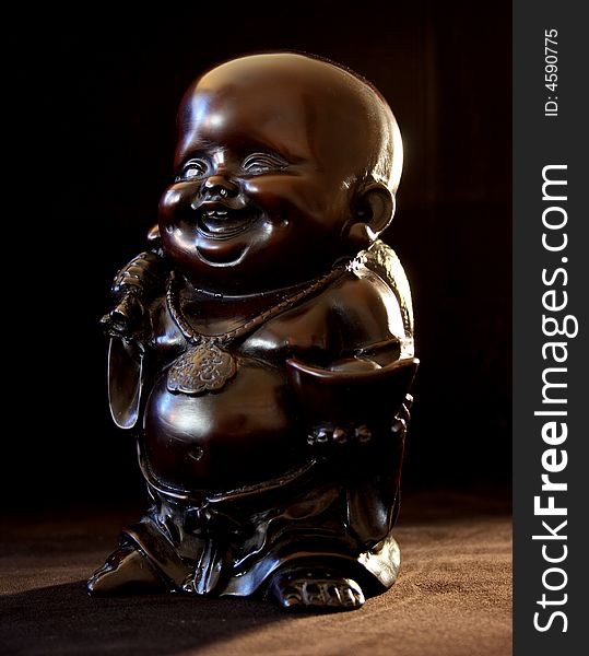 Smiling Buddha brings light to give you some happiness. Smiling Buddha brings light to give you some happiness