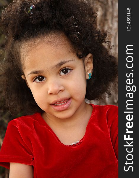 Young beautiful multiracial girl with afro hairstyle. Young beautiful multiracial girl with afro hairstyle