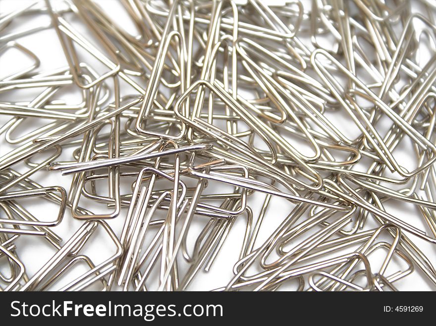 Paper clips on the white isolated background
