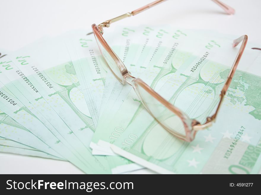 Modern eyeglasses over money euro. Modern eyeglasses over money euro