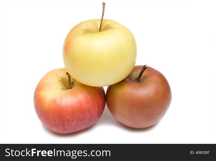 Three apples on the whie isolated background