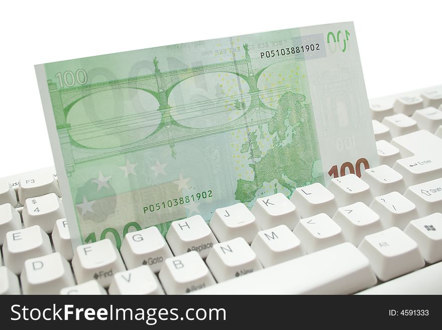 One 100 euro banknote over keyboard