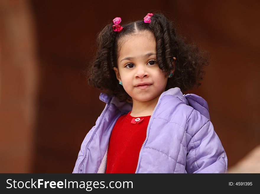 Young beautiful multiracial girl with afro hairstyle. Young beautiful multiracial girl with afro hairstyle