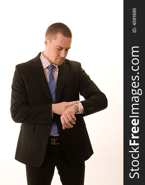 Portrait of a young businessman on white background