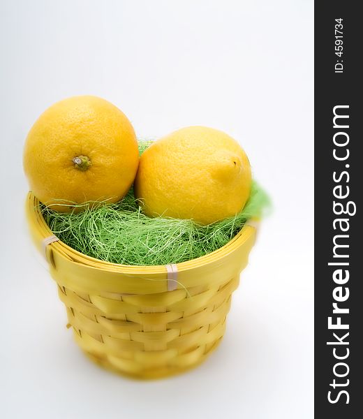 Two lemon fruits on a white background