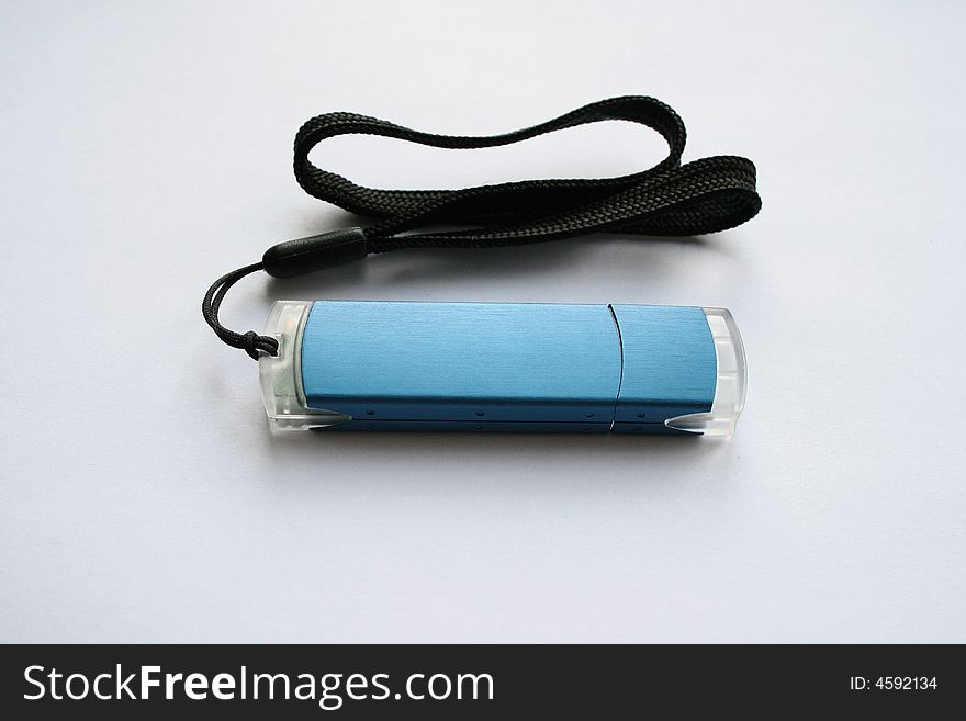 Blue flash disk drive on white