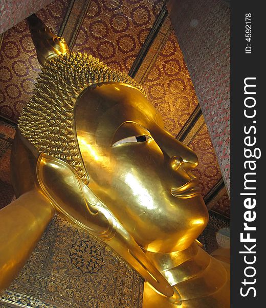 Reclining Buddha golden statue in Bangkok