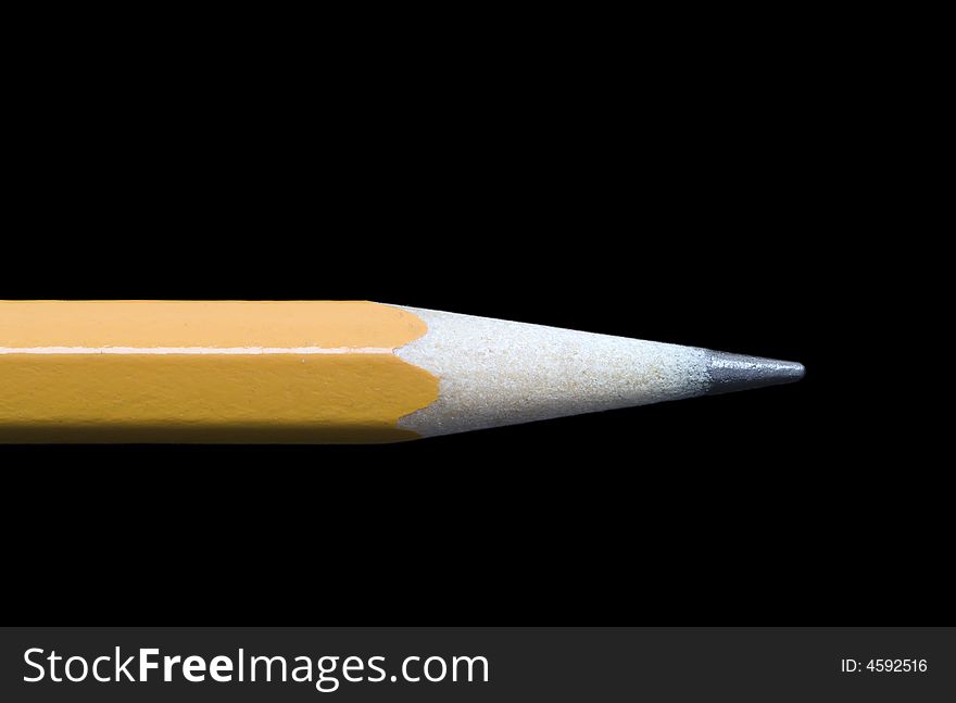 Closeup of a regular number 2 pencil shot against a black background. Includes clipping path.