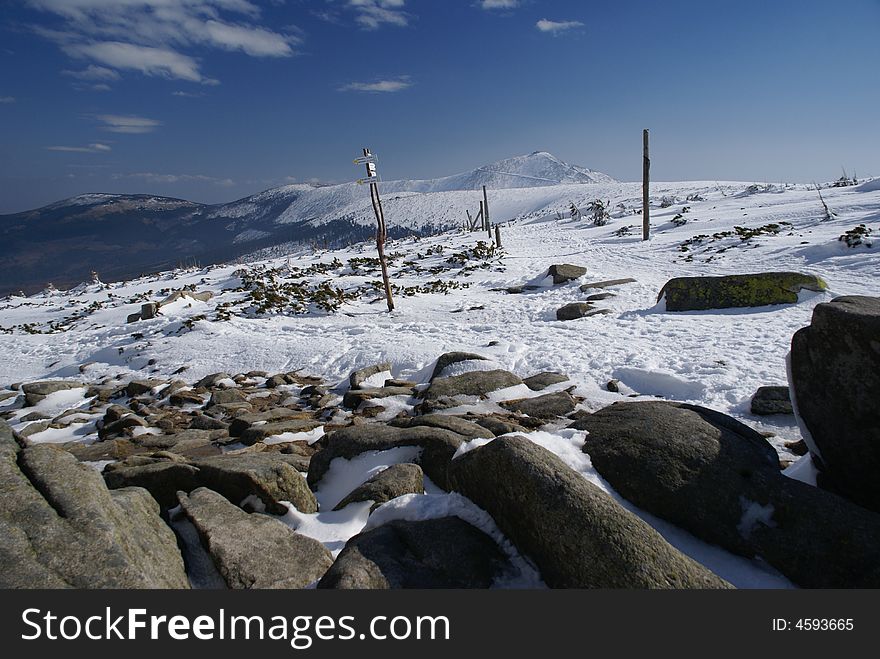 Winter landscape on sunny day with the highest Czech mountain - Snezka (Sniezka, Schneekoppe)