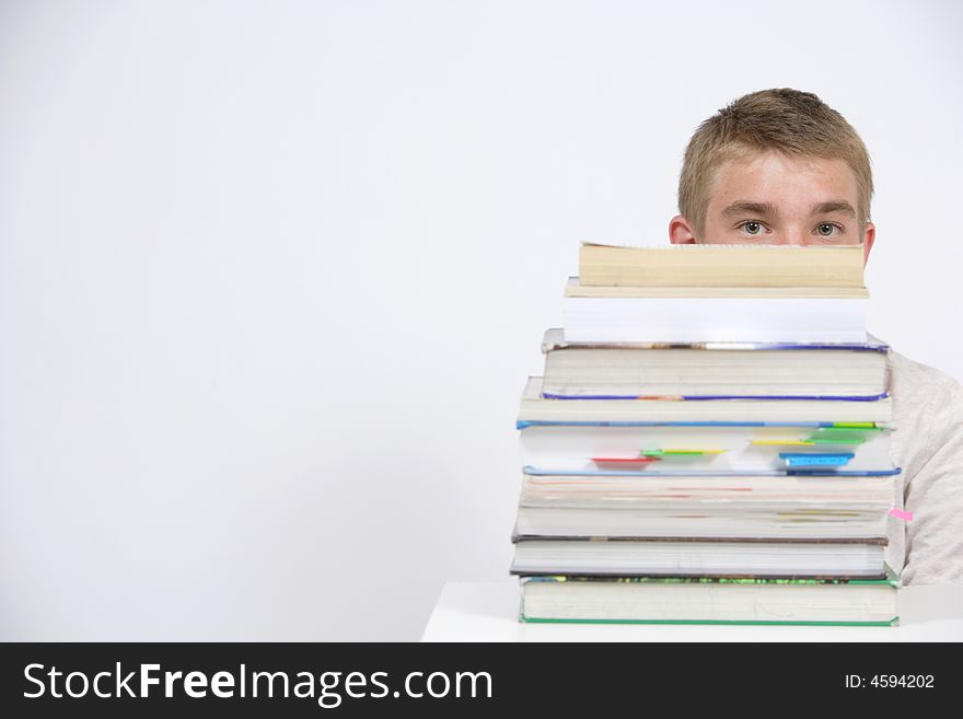 A teen age student over whelmed with home work