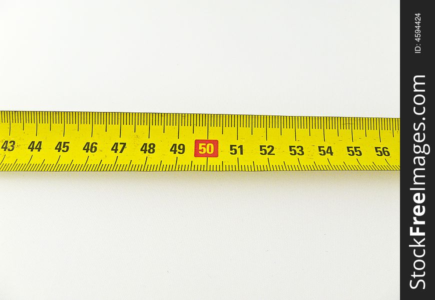 Yellow measure on white background