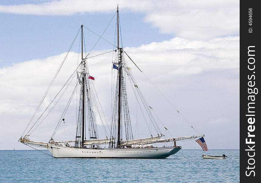 Double masted wooden sailing vessel. Double masted wooden sailing vessel