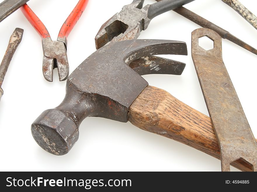 Old vintage hammer with tools laying around. Old vintage hammer with tools laying around