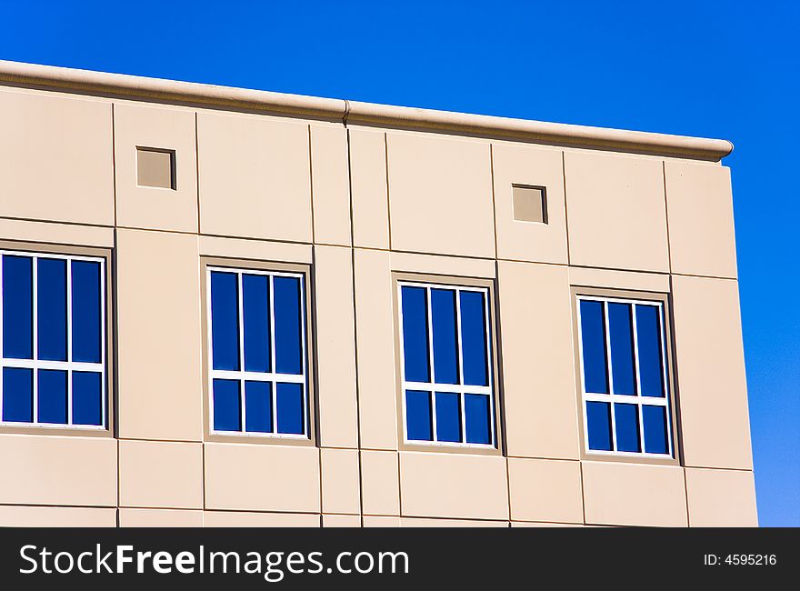 Picture of a building with blue windows