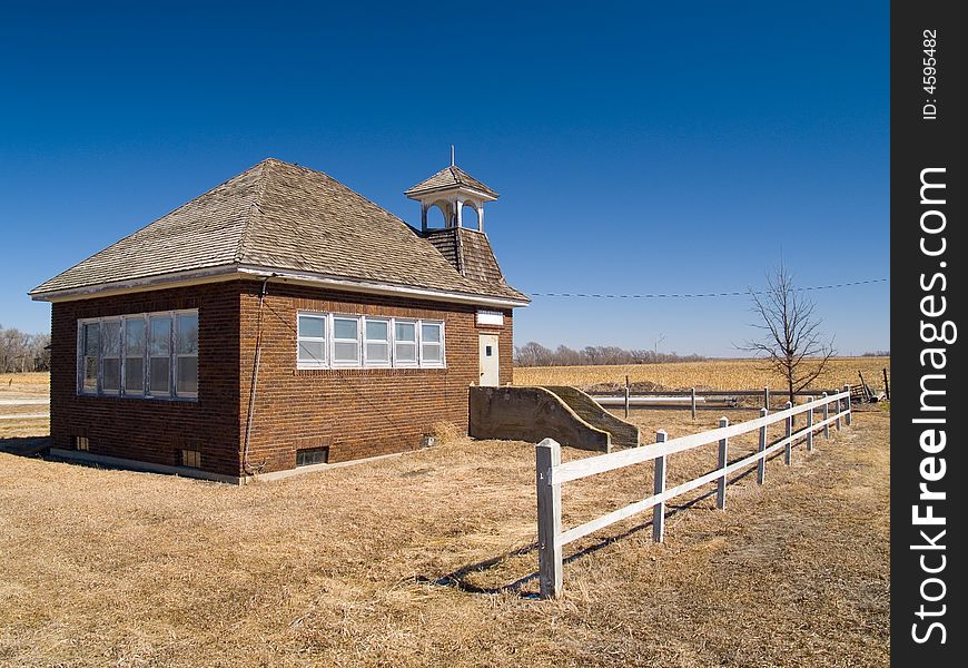 An old one room school house on the vast Nebraska prairie. An old one room school house on the vast Nebraska prairie