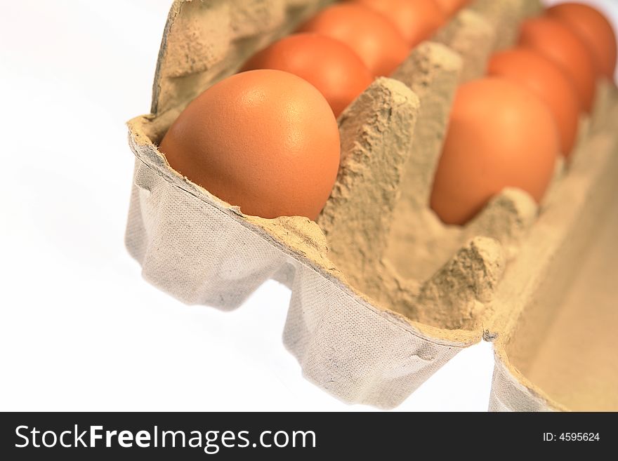 Farm fresh organic brown eggs isolated on a white background. Farm fresh organic brown eggs isolated on a white background