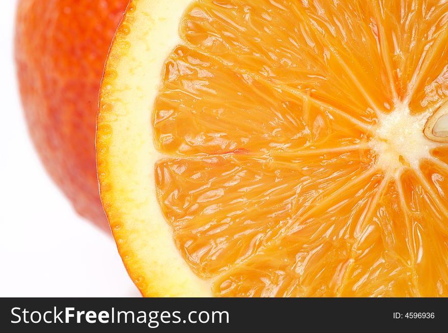 Perfectly fresh orange, on white, close-up. Perfectly fresh orange, on white, close-up