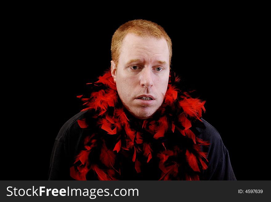 Man given up on the party with a lot of feathers