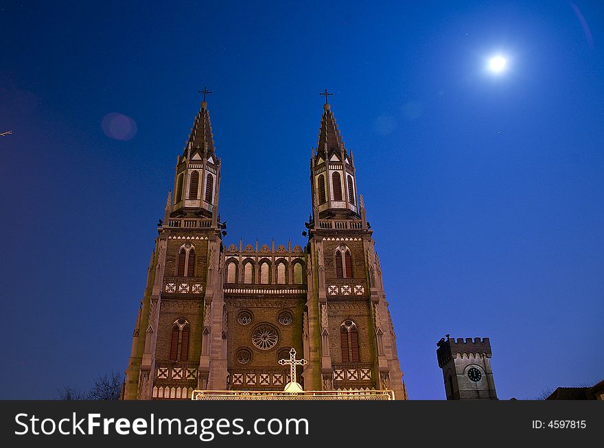 The Church in the night. The full moon is in the sky. The Church in the night. The full moon is in the sky.