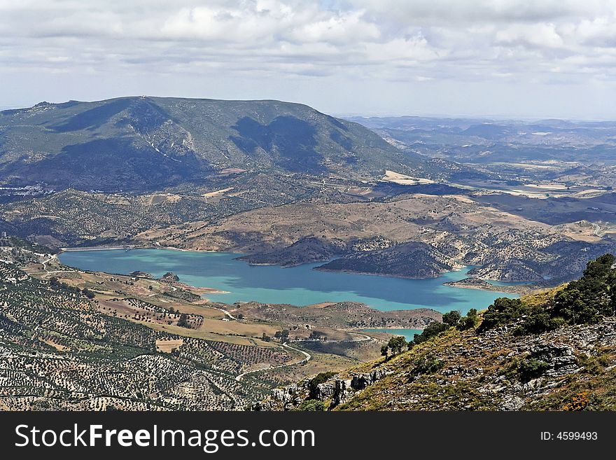 Hill and lake in Andalusia, Spain, route white villages