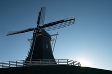 Windmill At Sunset Royalty Free Stock Photos