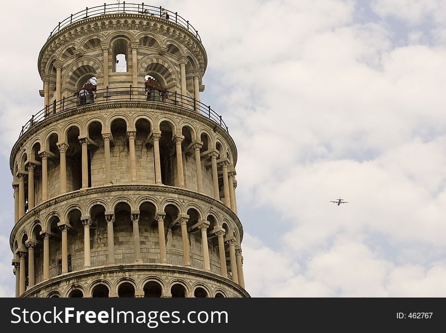 Leaning tower of pisa with plane in the sky. Leaning tower of pisa with plane in the sky