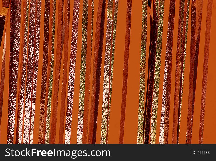 Foil streamer abstraction orange background. Foil streamer abstraction orange background
